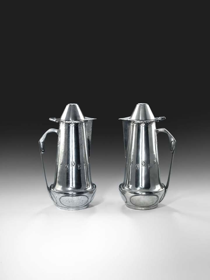 A PAIR OF JUGS 